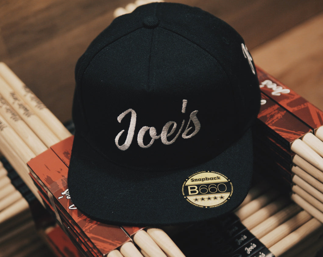 Joe's Drumsticks logo black snapback cap hat