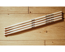 Load image into Gallery viewer, two pairs of Joe&#39;s Master Series 5A American Hickory Drumsticks on wooden background